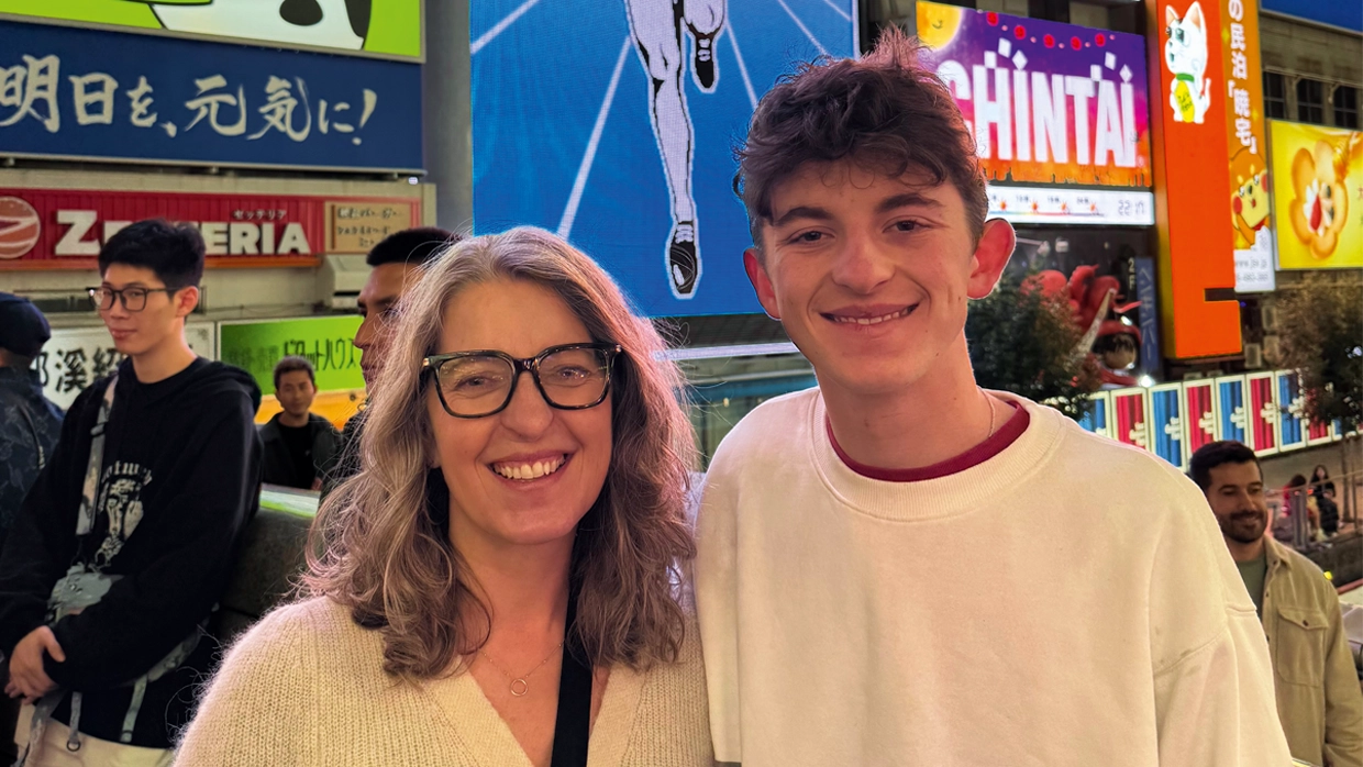 Cheryl and Stan in Dotonbori, the modern heart of Osaka.webp