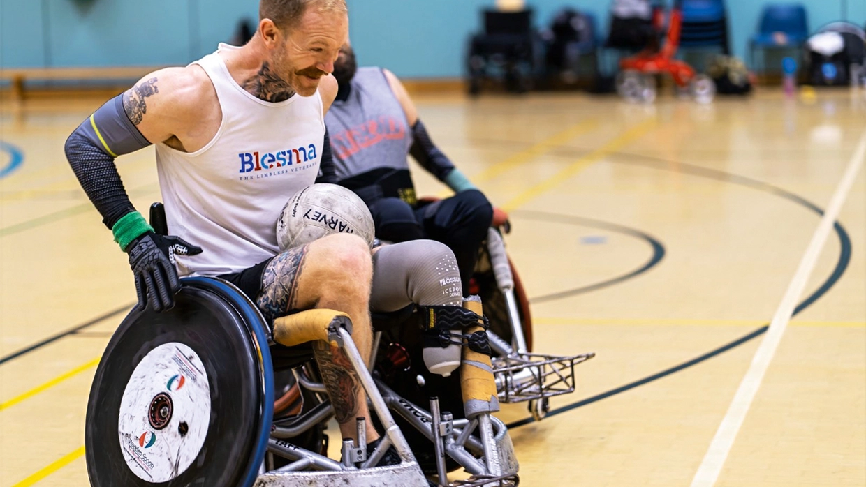 Photo of Ray playing wheelchair rugby.webp