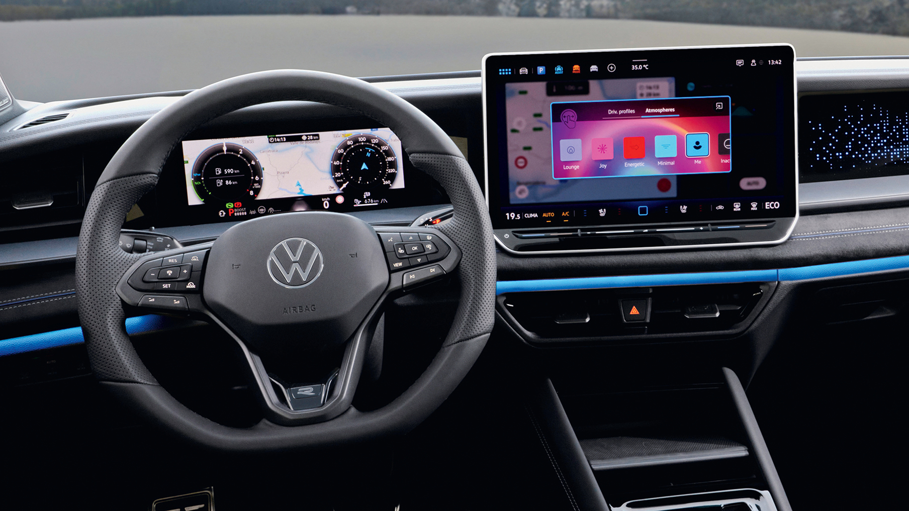 Volkswagen Tayron interior, steering wheel and infotainment screen.jpg