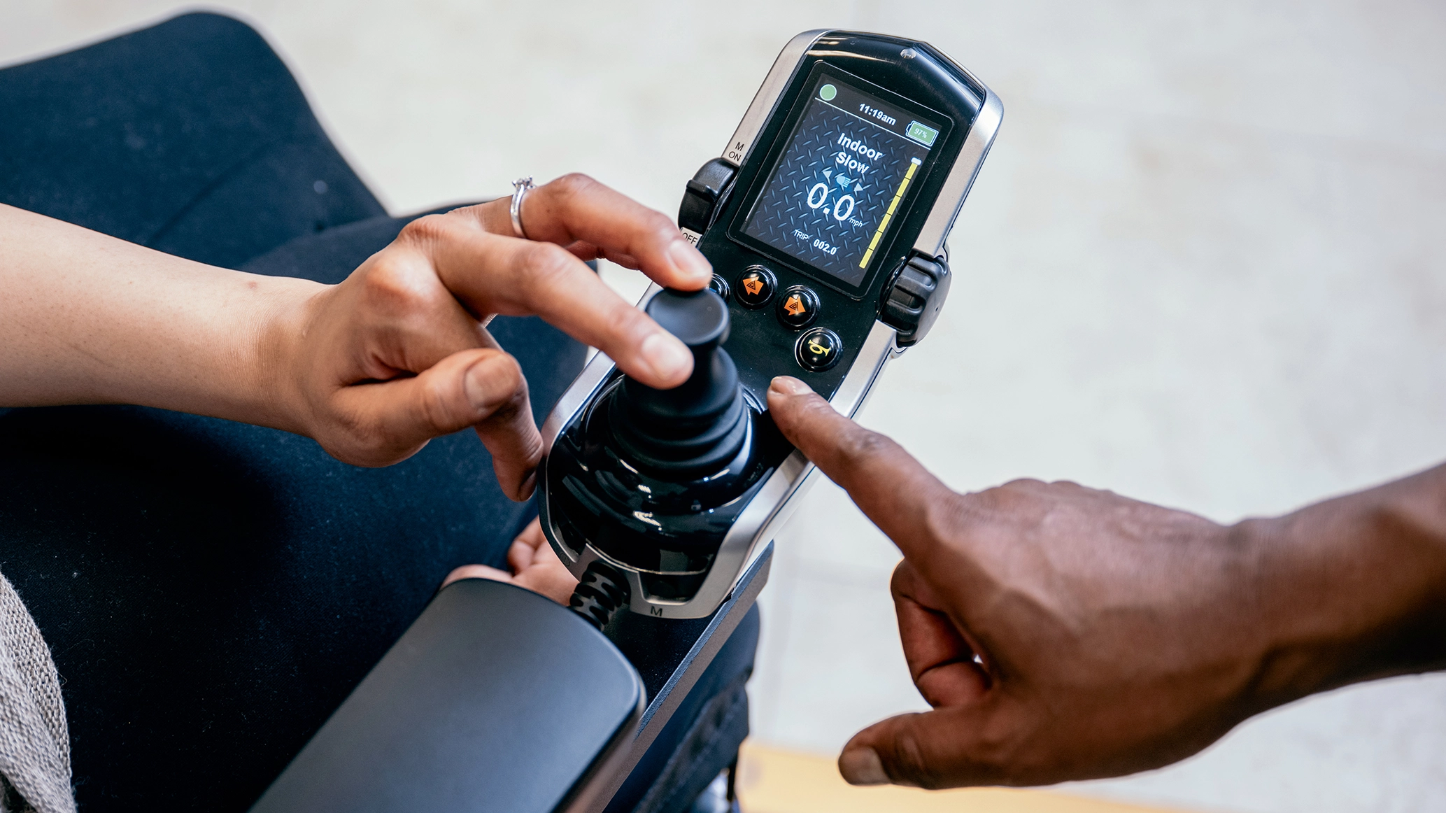 a-close-up-of-hand-controls-on-a-powered-scooter-or-wheelchair.webp