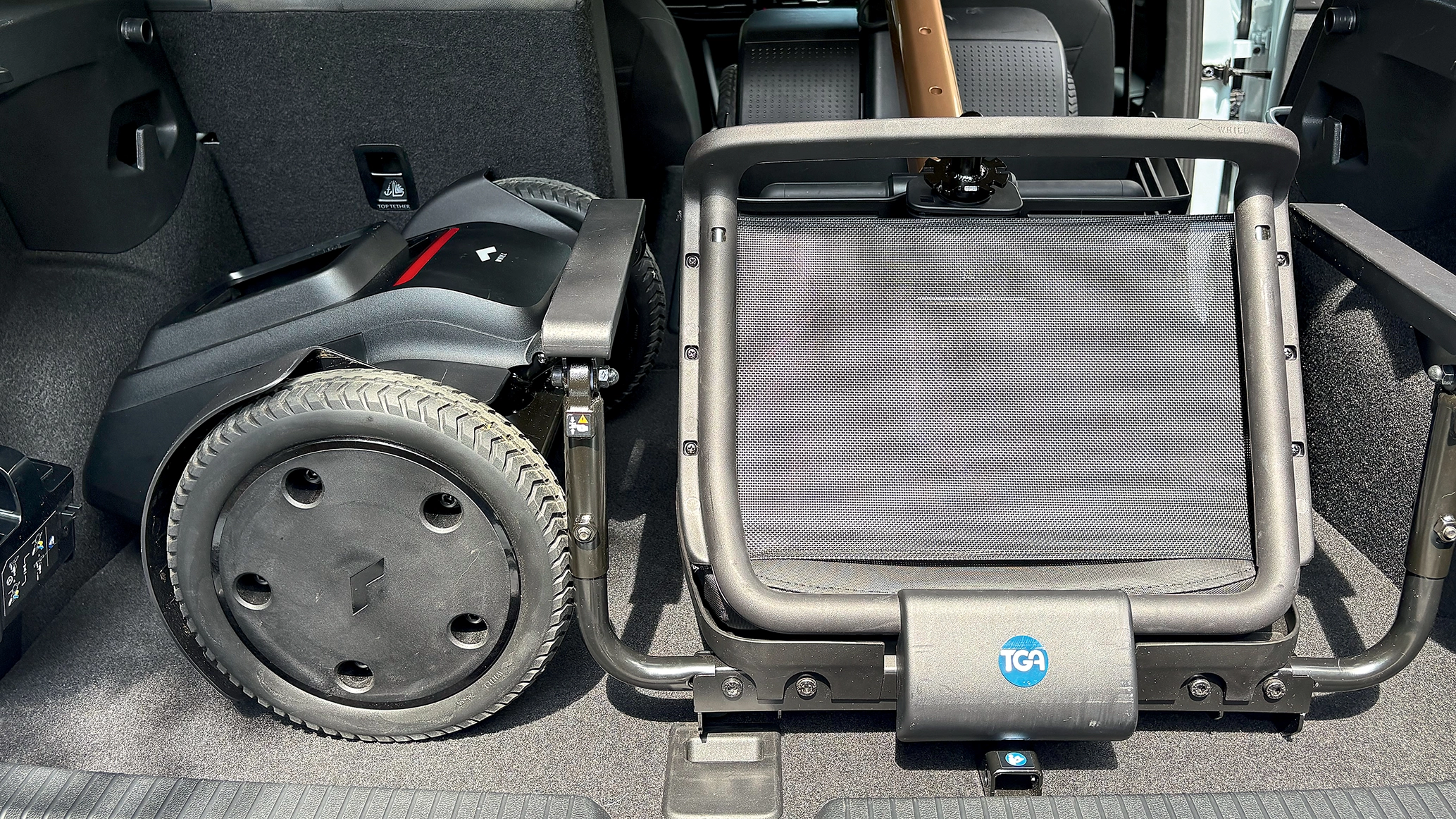 a-mobility-scooter-stowed-in-the-boot-of-a-golf-ehybrid.webp