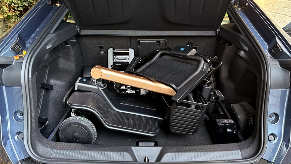 a-mobility-scooter-stowed-within-the-boot-of-the-cupra-tavascan.webp