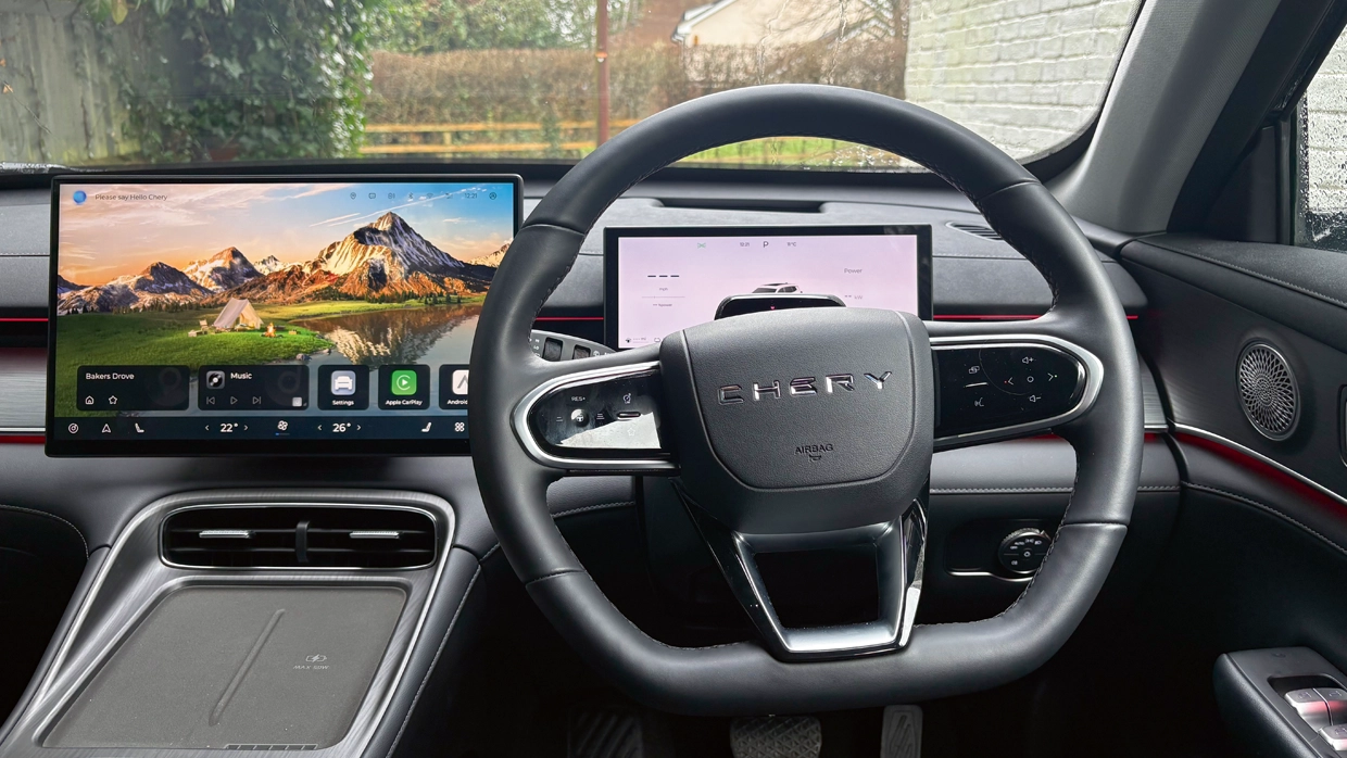 interior-of-a-chery-tiggo-8-featuring-a-large-central-infotainment-screen-digital-instrument-cluster-and-multi-function-steering-wheel.webp