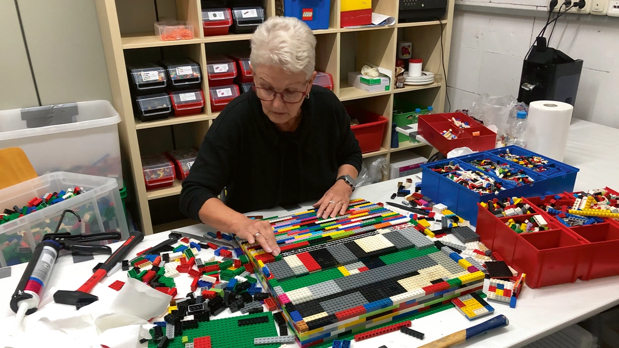 Rita building lego ramps 
