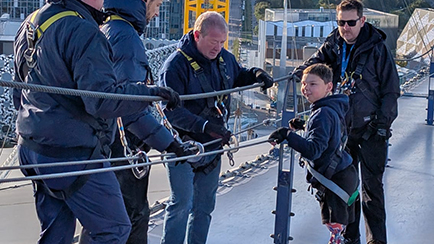 Photo of Tony climbing the O2