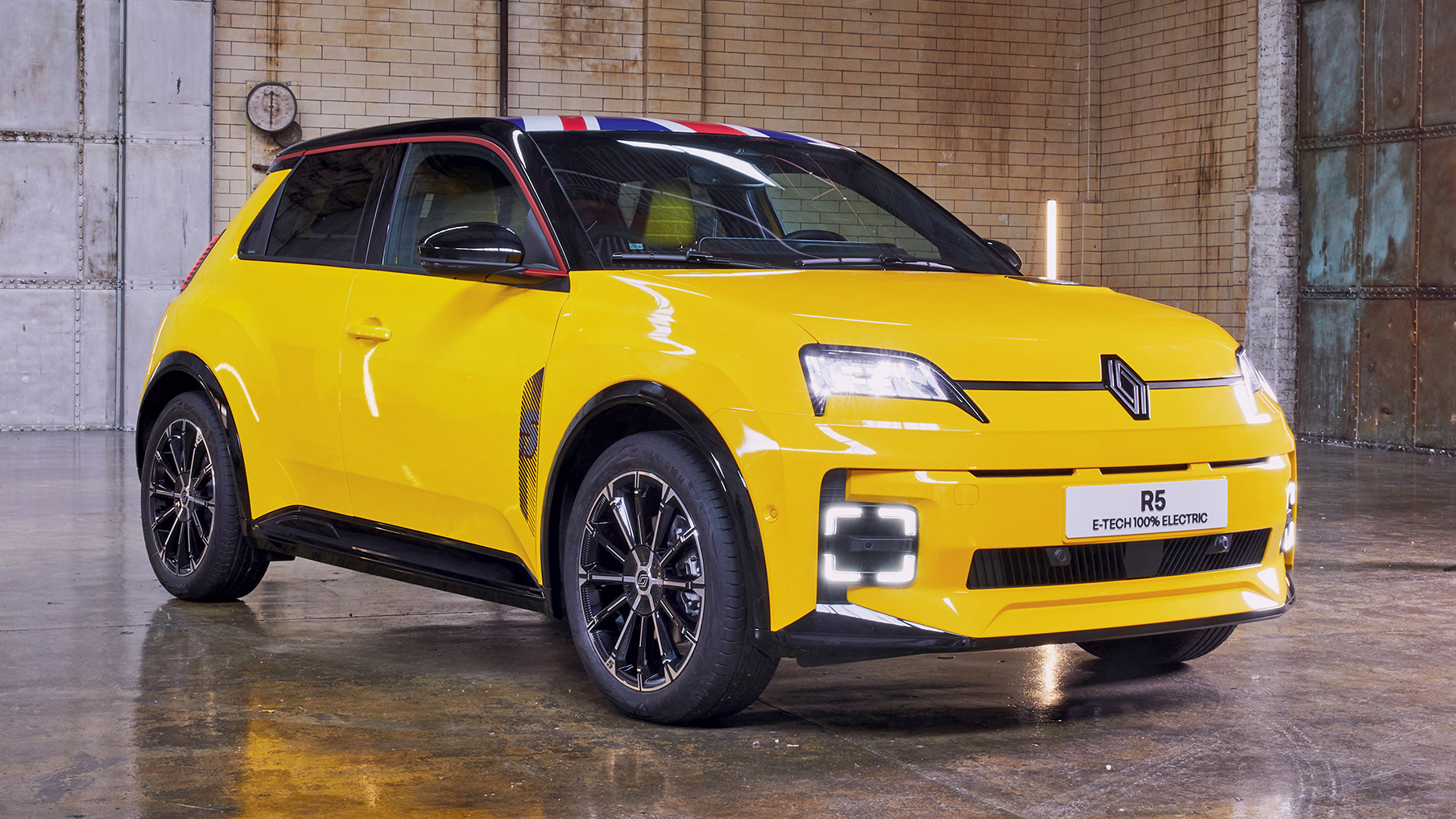 Yellow Renault 5 sat in a warehouse