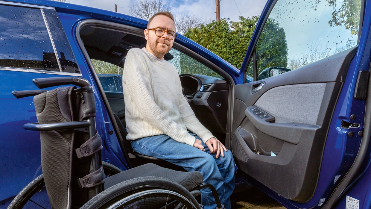 steven-sat-in-his-renault-clio.webp